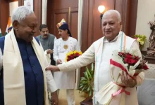 swearing-in ceremony setup with political leaders and an official stage representing the new Bihar government formation.