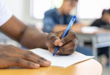 Students entering an examination hall for Maharashtra HSC Class 12 board exams.